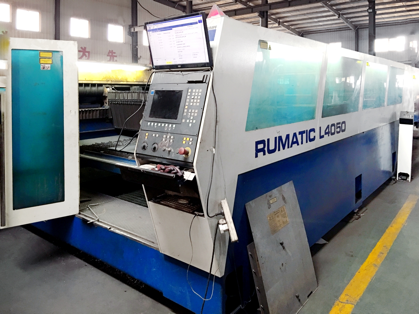 Laser cutting of steel plate for parking lift structural components at the MUTRADE factory